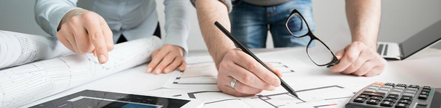 Picture of People looking at building plans